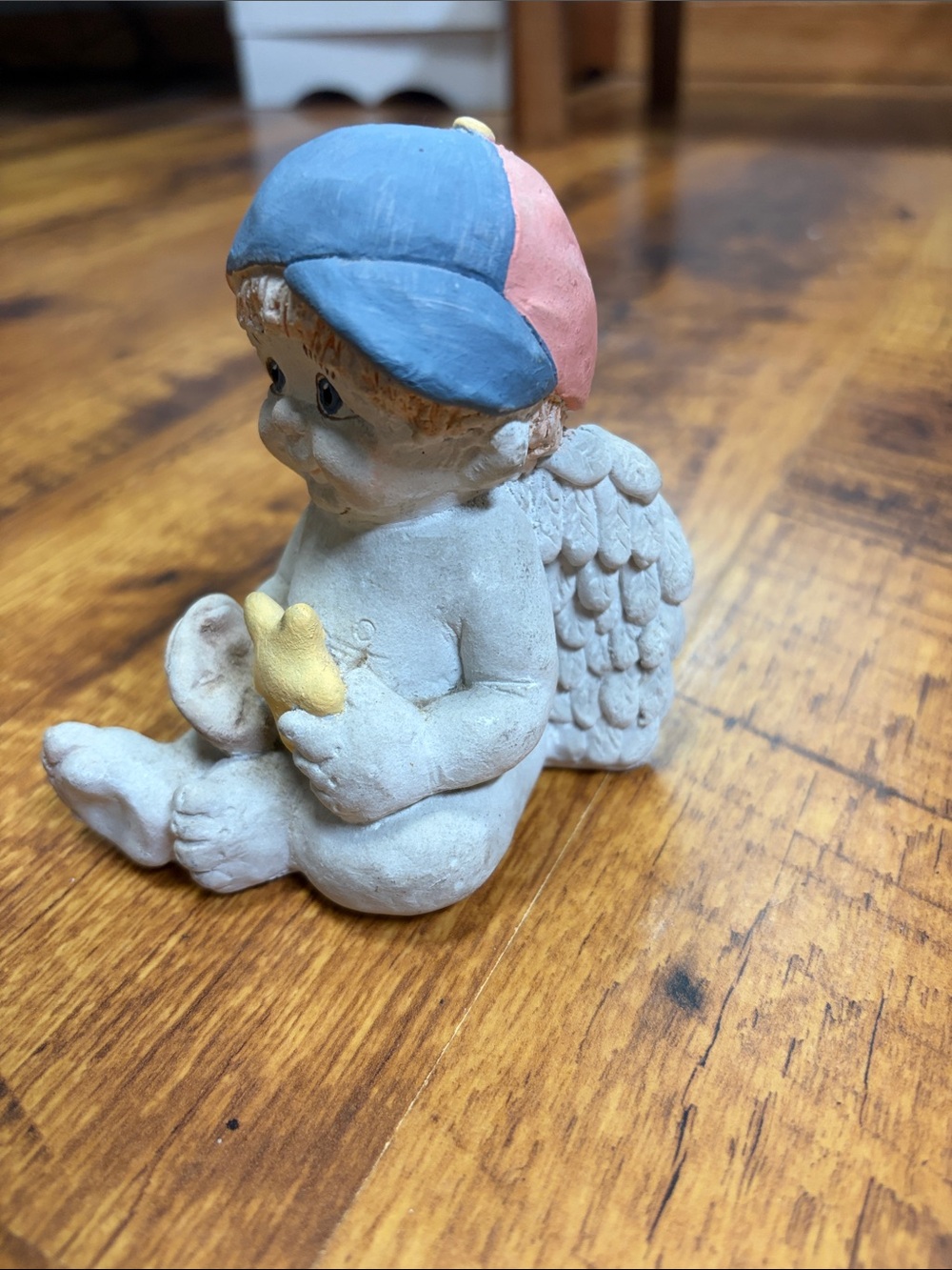 Hand-Painted Cast art Figurine with Blue and Pink Cap